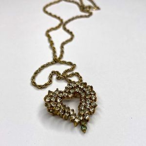Gold toned and rhinestone heart pendant necklace